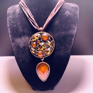 Animal/Leopard gold tone multi stone tear drop statement necklace on brown cord